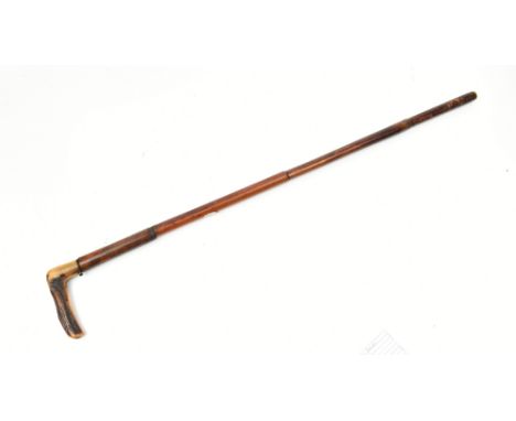 A 9.1mm x 40 Malacca shafted centre fire walking stick gun with horn handle, overall length 84cm.Additional InformationWe are