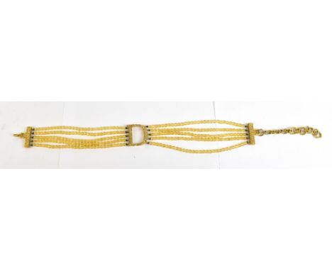 CHRISTIAN DIOR; a vintage gold toned 'D' and gold beaded choker, with a textured diamante clasp and chain, approx 28cm, in Di