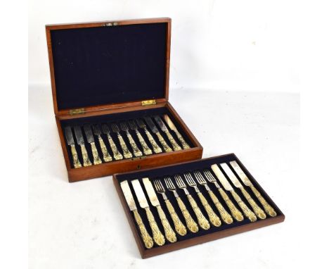 CHAWNER &amp; CO; a Victorian hallmarked silver twelve setting table service, with gilded handles each having cast scrolling 