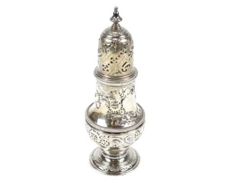 JABEZ DANIELL; a George II hallmarked silver sugar caster, with repoussé foliate decoration and gadrooned detail on spreading