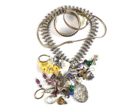 A quantity of costume jewellery including silver necklace, bangle, various chains, etc.