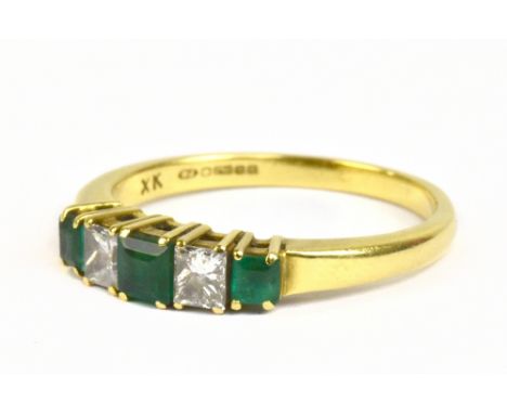 An 18ct yellow gold emerald and diamond five stone ring, size R, approx 3.8g.