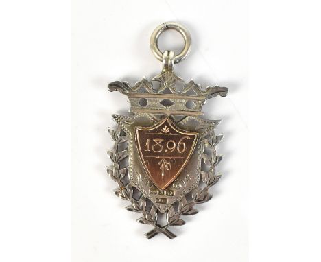 A late 19th century hallmarked silver football medal inscribed 'S.C.F.C.' to obverse and '1896' to reverse, 4.3 x 2.8cm, in a