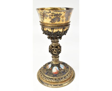 KRONENBITTER OF MUNICH; a late 19th century silver gilt and enamel decorated chalice of Gothic design, with bell shaped bowl 