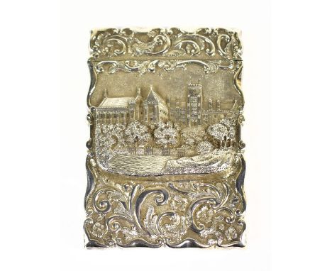 A Victorian hallmarked silver 'Castle Top' card case of rectangular form, with scrolling case, detailed castle embossed front