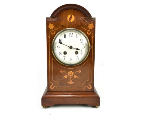 An Edwardian inlaid mahogany mantel clock, the circular dial with Arabic numerals, height 36cm (af).Additional InformationThe