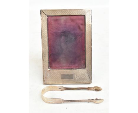 SAMUEL M LEVI; a George V hallmarked silver easel back photograph frame, with engine turned decoration surrounding a rectangu