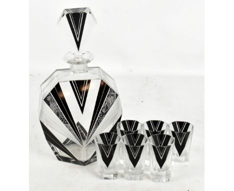 An Art Deco glass seven piece drinking set, each with black and frosted geometric decoration, height of decanter 25cm.Additio