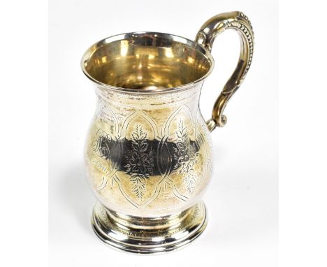 HILLIARD &amp; THOMASON; a Victorian hallmarked silver christening&nbsp;mug with stylised scrolling handle and foliate engrav