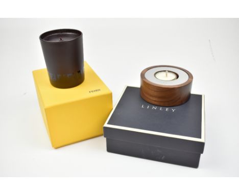 FENDI; an aroma candle in original Fendi box, height 9cm, and a Linley walnut and polished nickel Circle Candle, supplied wit