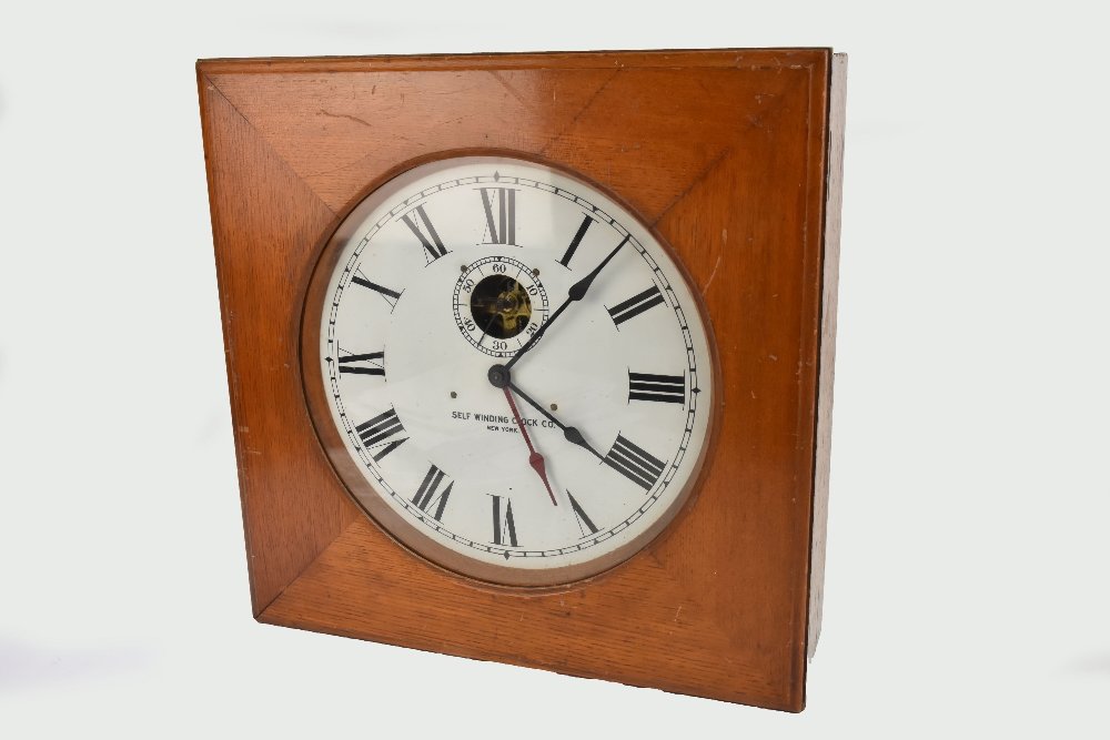 SELF WINDING CLOCK CO OF NEW YORK; an early 20th century wall mounted
