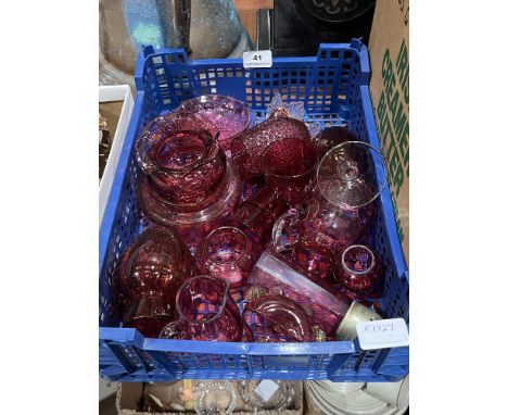 A box of cranberry and ruby glassware.