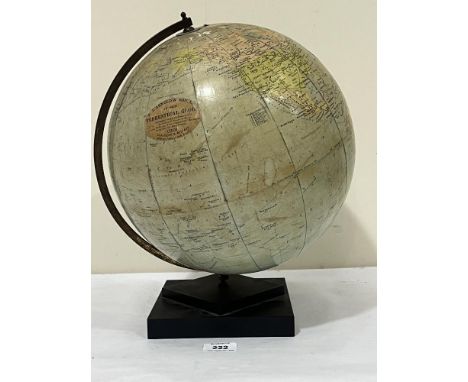 A 12" terrestrial globe by E.J. Arnold and Sons.