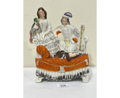 A 19th Century Staffordshire flat back group of a gentleman with lute and a lady with bird. 10" high
