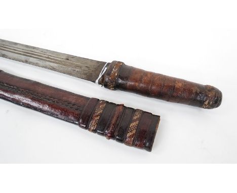 A 19th Century Sudanese sword with leather covered scabbard