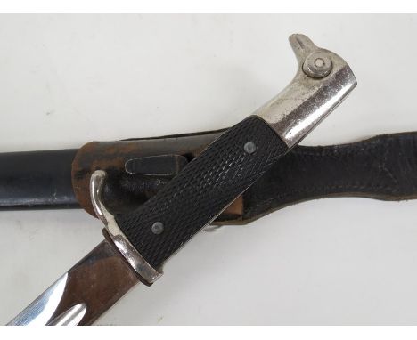 A German dress bayonet by Anton Wingen Jr, Solingen with steel scabbard and leather frog