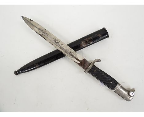 A German K98 dress bayonet with spear-point single fullered blade engraved 'Fur Erinnerung an Meine Dienstceit' with swastika