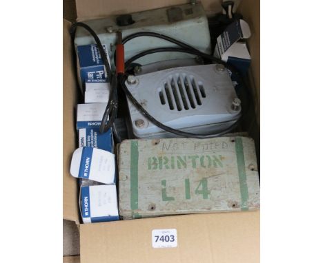 A box of items from a Royal Navy scrapped Minesweeper
