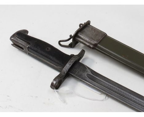 A US M1 bayonet with M7 type scabbard, marked U.F.H