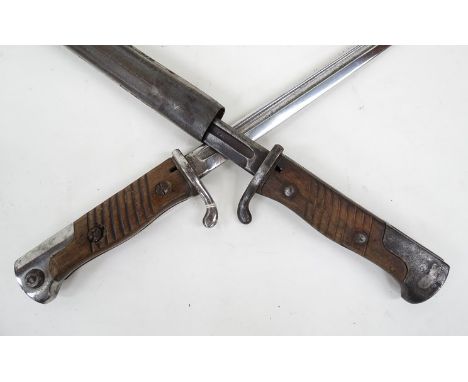 A German Seitengewehr 98 aA Mauser sword Bayonet with ribbed wooden grips, Simson & Co Suhl, all metal scabbard and another b