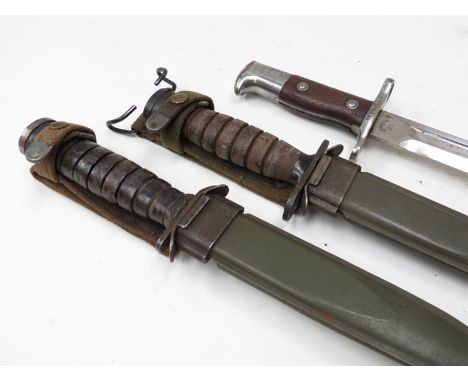 A US M1892 bayonet numbered 209641 to hilt with brown leather scabbard a/f a US bayonet knife M4 with leather grips and canva