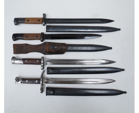 A Czechoslovakian Bodak V5/24 bayonet with steel scabbard, an unissued example, a Finnish Fiskers bayonet with scabbard and a