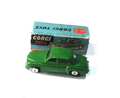 Corgi 204M mechanical Rover 90 saloon in original box  poor condition flaps missing  in good used condition as shown missing 