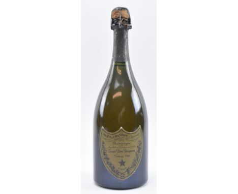 A vintage 1988 Cuvee Dom Perignon Champagne, Moet et Chandon a Epernay. 750ml bottle. 12.5% vol. Foil wrap by cork teared, bu