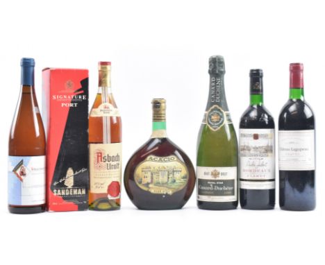An assortment of seven vintage Continental white, red &amp; rose wine bottles. The lot to include a 1998 Andre Jalbert Bordea