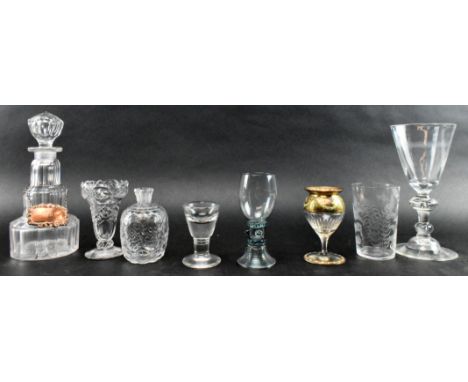 A collection of eight pieces of 18th century &amp; later glassware. The lot comprising a large baluster goblet glass with kno
