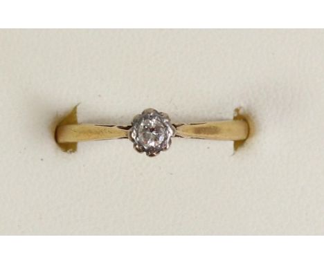 An 18ct gold single stone diamond ring, illusion set with a brilliant cut stone, approximately 0.15cts, N, 2.8gm 