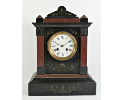 A Victorian black slate a red variegated marble architectural mantle clock, white enamel dial, the unsigned movement numbered