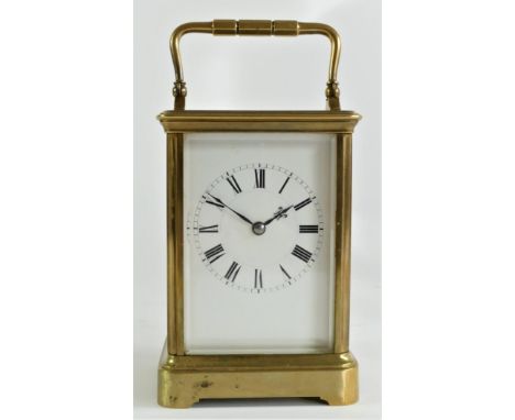 Henri Jacot, Paris, a 19th century French brass carriage clock, white enamel dial, the signed movement striking the hour and 
