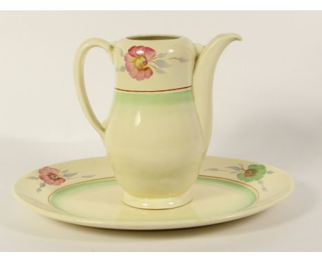 Clarice Cliff for Wilkinson Ltd., a Sundew pattern water jug, 15cm and a matching oval platter, 27 x 20cm (2) 