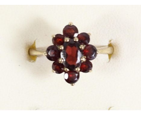 A 9ct gold and garnet cluster ring, M, 2.8gm 