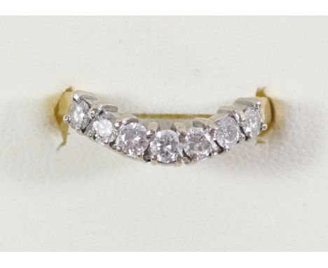 An 18ct gold and diamond half eternity ring, claw set with brilliant cut stones, approximately 0.7cts, colour estimate H/I, c