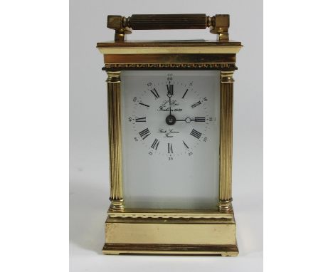 L'Epee, a French brass carriage time piece, signed white enamel dial, signed movement, reeded column case, key 13cm 
