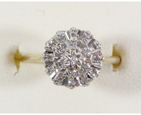 A 9ct gold and diamond cluster ring, J, 2.7gmCondition report; Very good condition, no issues