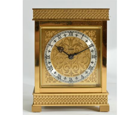 Luxor, a gilt brass mantle clock, the fretwork dial with a silvered chapter ring, the 8 day Swiss movement striking the hour 