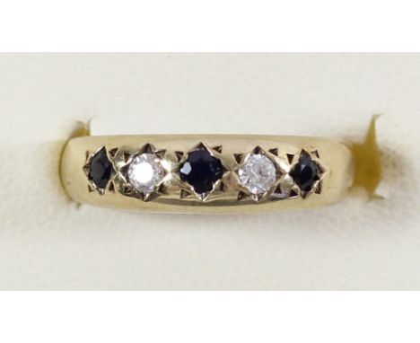 A 9ct gold Edwardian style sapphire and diamond five stone ring, set with brilliant cut stones, I 1/2, 1.6gmCondition report;