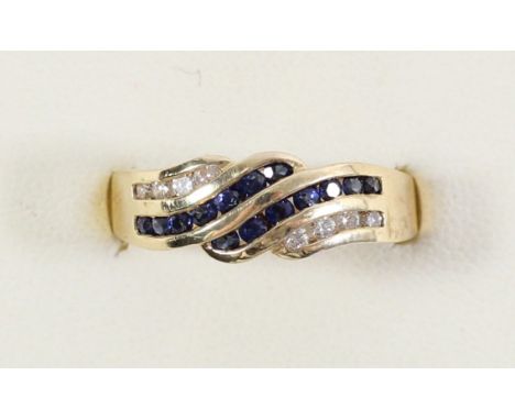 A 14K gold, sapphire and brilliant cut diamond ring, channel set, L 1/2, 3.9gmCondition report; Very good condition, no issue