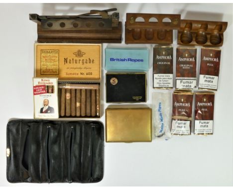 A novelty five bar gate five pipe rack, two three pipe racks, various pipe tobacco and other smoking related items 