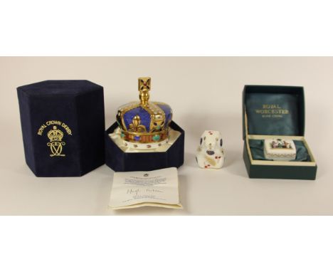 A boxed Royal Crown Derby crown paperweight with silver plug, stamped 'One Hundred Royal Years 1890-1990' with certificate, t