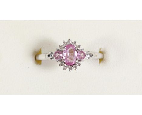 A 9ct white gold, pink sapphire and diamond cluster ring, O, 2gm 