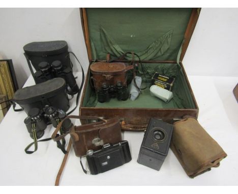 3 pairs Binoculars and vintage cameras in a vintage suitcase
