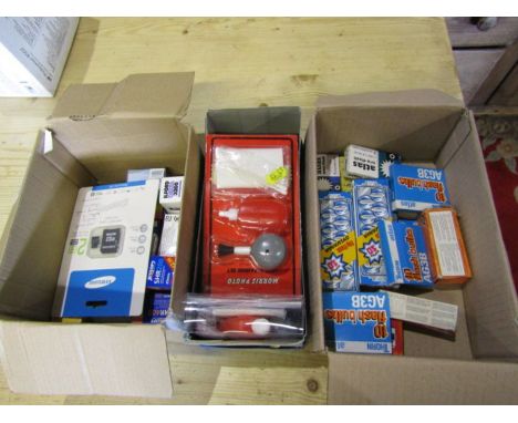 Three boxes including vintage flash bulbs, camera cleaning kit, memory card and films 