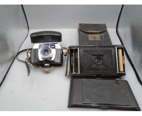 One Halina Paulette. One vintage folding camera 
