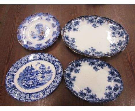 4 vintage blue plates
