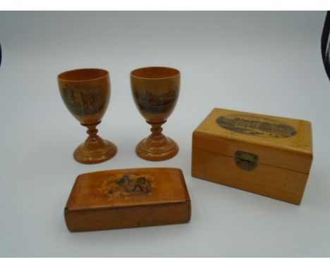 Collection of mauchline ware to incl 2 egg cups and a box depicting royal Windsor and Sandringham House plus a snuff box with