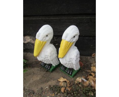 2 garden birds and a planter